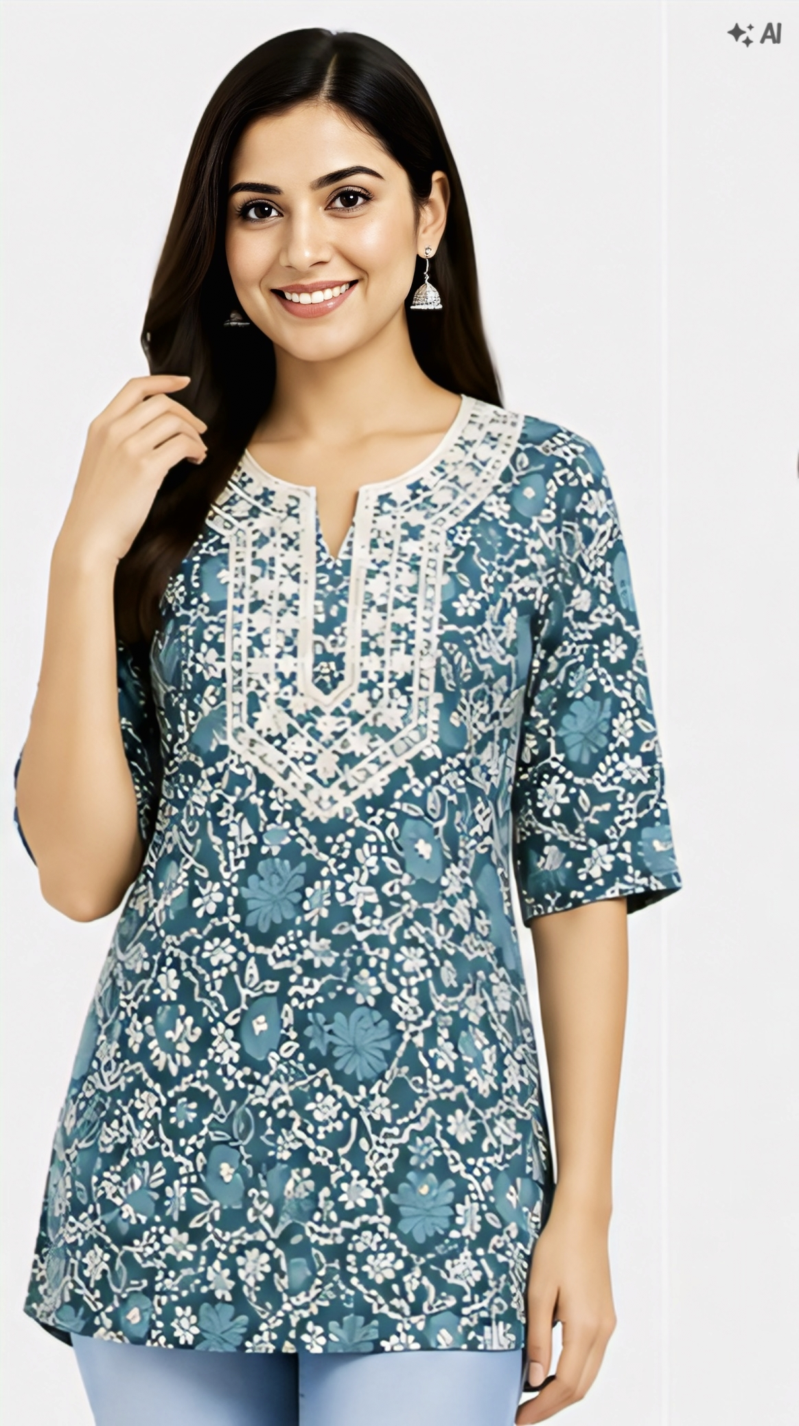 Women's teal blue floral printed cotton free size short kurti with designer neckline for casual and daily wear.