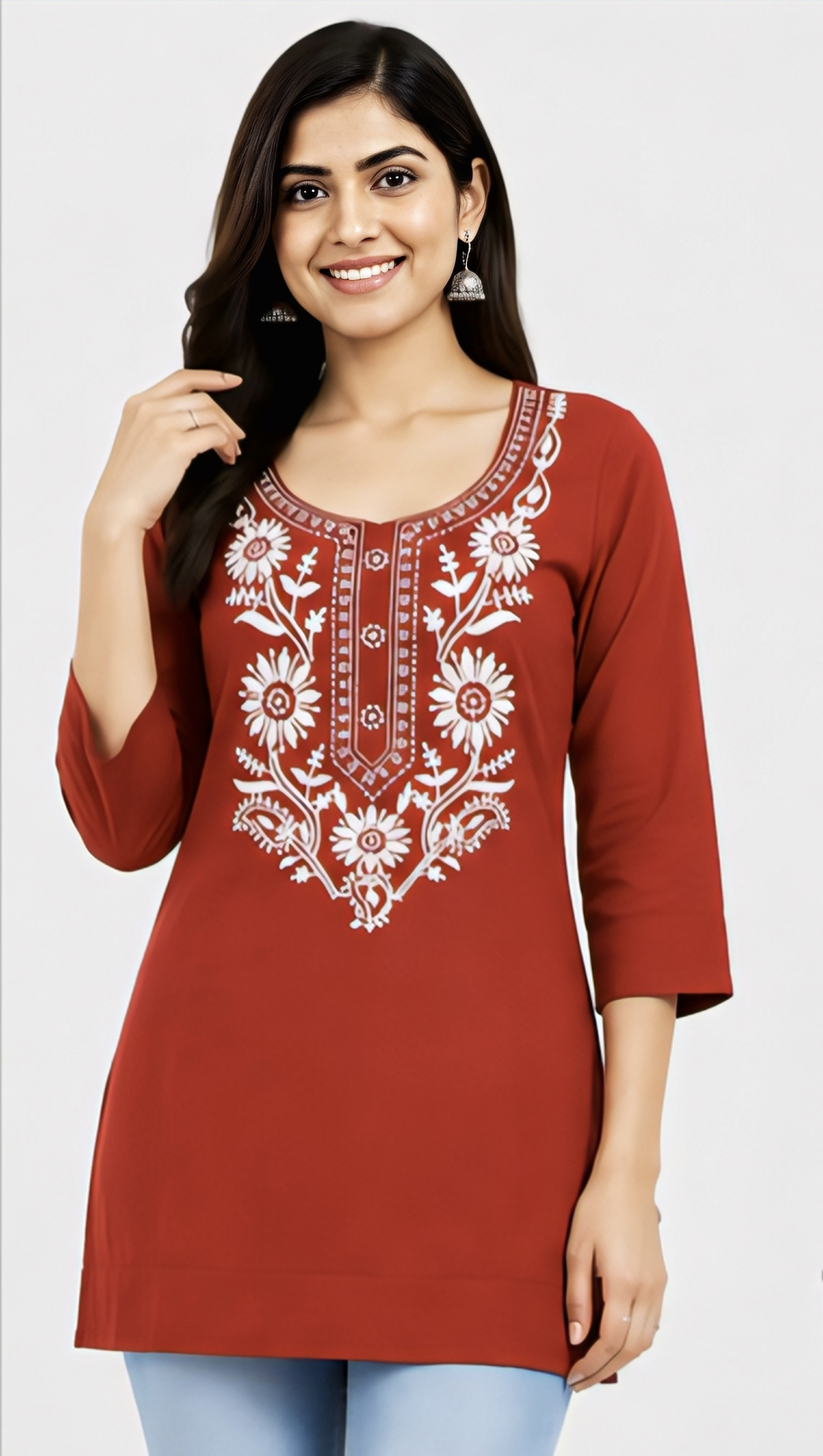 Women's red floral embroidered kurti with 3/4 sleeves and detailed necklineWomen's red floral embroidered kurti with 3/4 sleeves and detailed neckline