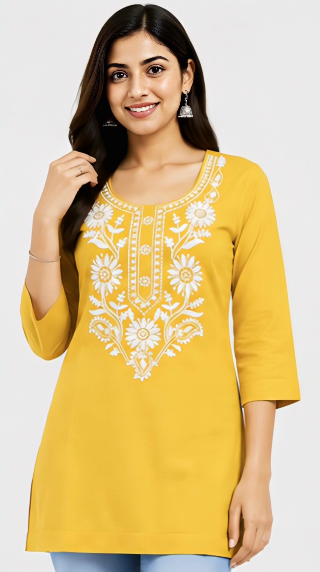 Women's yellow floral embroidered kurti with 3/4 sleeves and detailed neckline