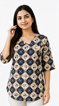 Women wearing a navy blue printed cotton tunic top with geometric pattern, V-neck and free-size fit