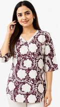 Women wearing a maroon floral printed cotton tunic top with V-neck and 3/4 sleeves, free size