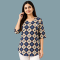 Women wearing a navy blue printed cotton tunic top with geometric pattern, V-neck and free-size fit