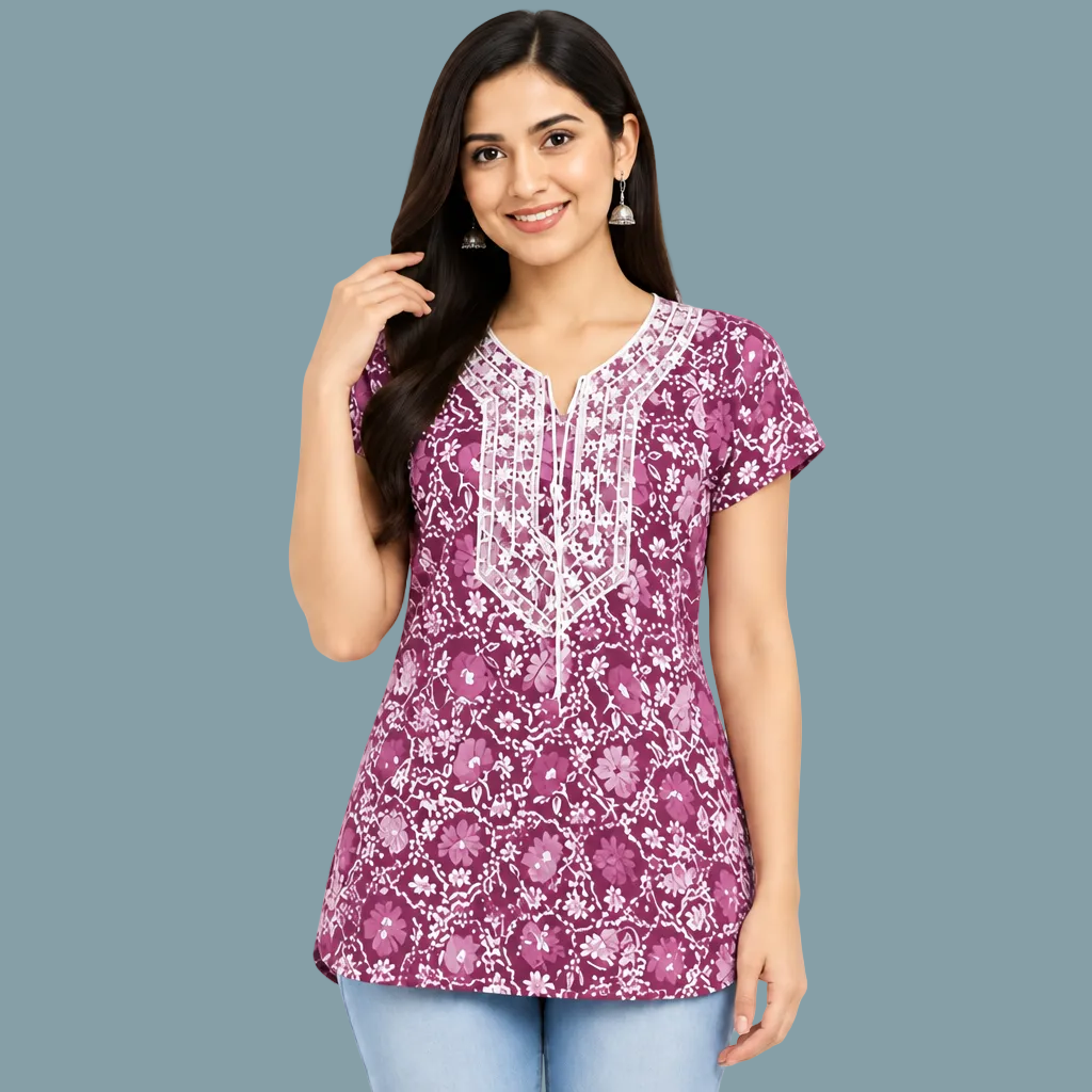 Women wearing a purple floral printed cotton tunic top with decorative front detail and free-size fit
